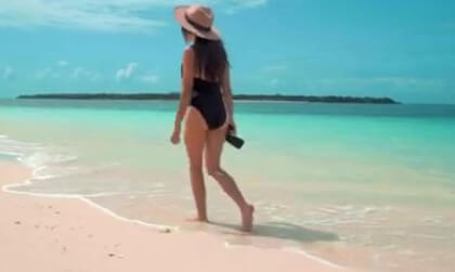 a lonely stroll at the beach