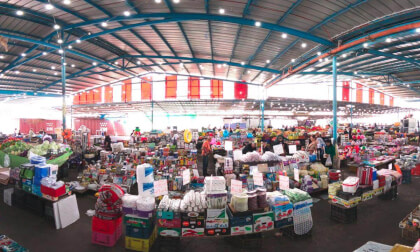 Stroll through the vibrant market filled with stalls offering colorful clothes, kitchenware, fruits, veggies, tasty local dishes, and lively haggling between energetic buyers and passionate sellers. VR Video Stroll through the vibrant market filled with stalls offering colorful clothes, kitchenware, fruits, veggies, tasty local dishes, and lively haggling between energetic buyers and passionate sellers. VR