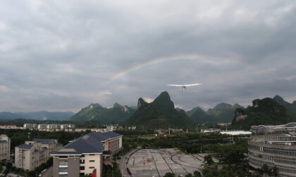 Tour Guilin University of Electronic and Technology on an electric motorcycles