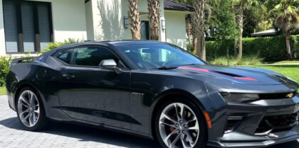 Walk round a fifty edition Camaro and drive through Las Vegas