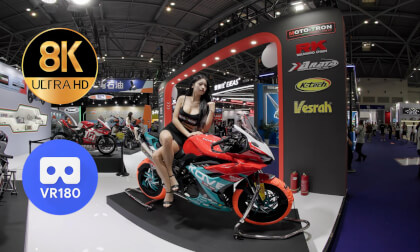 Two model girls at MOTO-TRON booth at CIMAMotor 2025 Two model girls at MOTO-TRON booth at CIMAMotor 2025