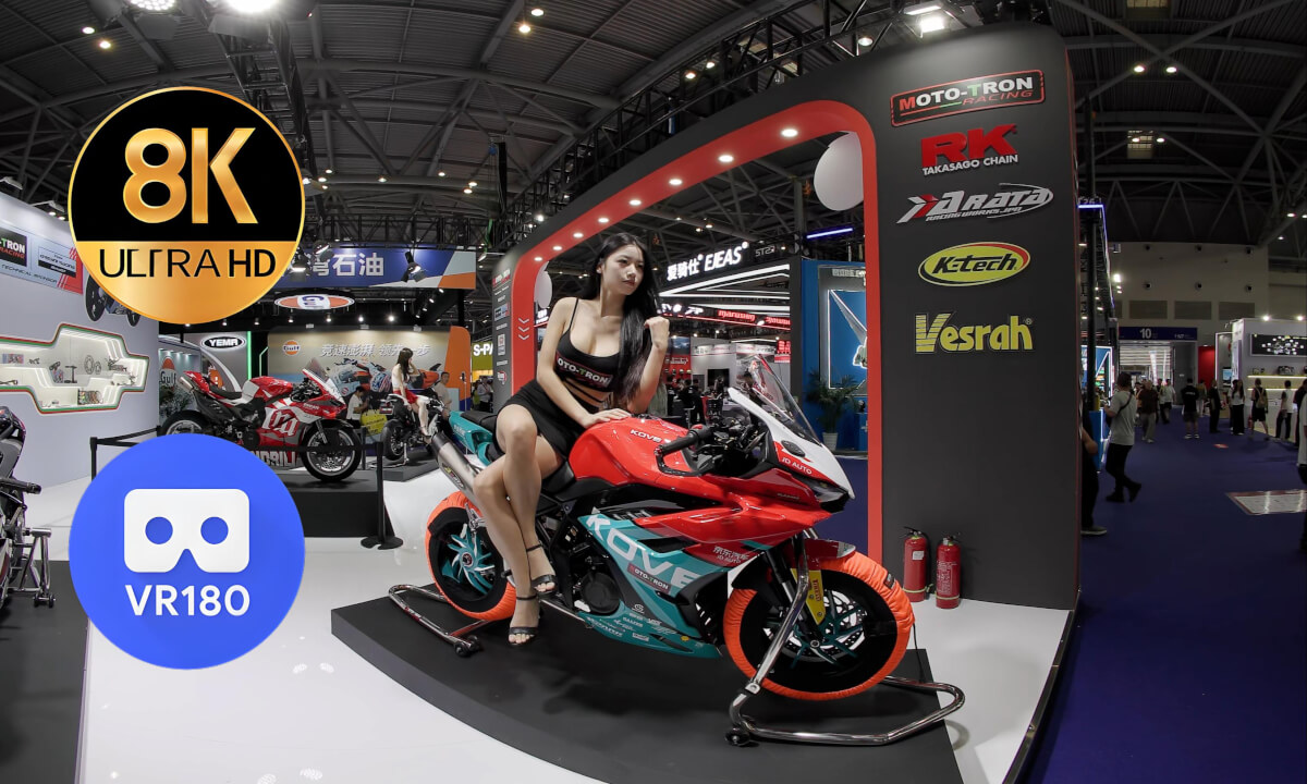 Two model girls at MOTO-TRON booth at CIMAMotor 2025