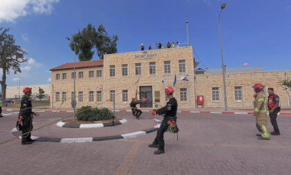 Northern District firefighters in Haifa, Israel, rescued an injured woman from the rooftop of the railway offices using a stretcher suspended on a zipline
