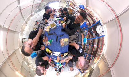 Firefighters enjoy hearty lunch after live fire drill in train hangar in Haifa, Israel.
