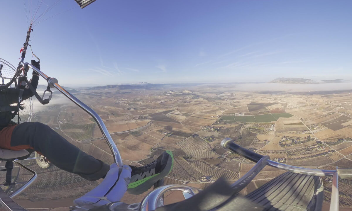 Paramotor Flight Over Pinoso – Through Fog and Clouds with Glory Reflections