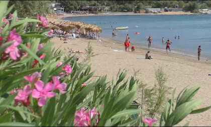 Greece Girl Playing Beach Paddleball