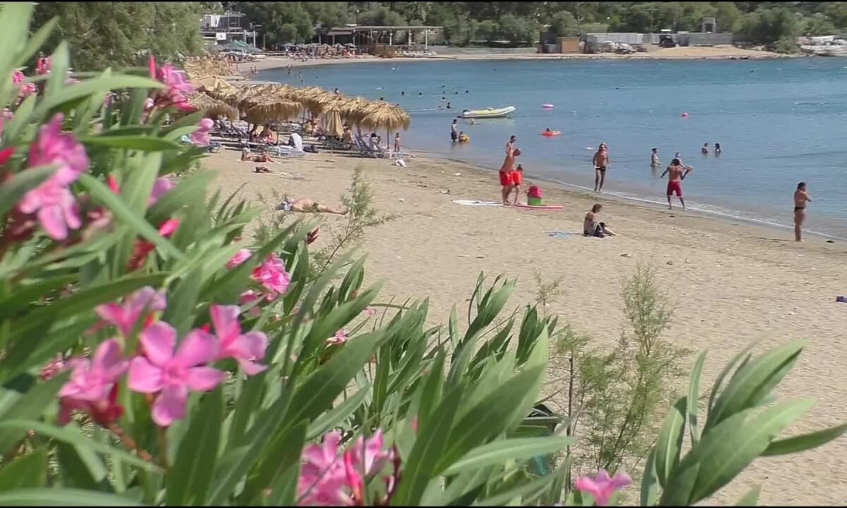 Greece Girl Playing Beach Paddleball
