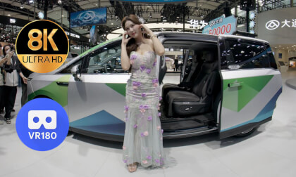 3 Girls in Floral Outfits at MAXUS Booth