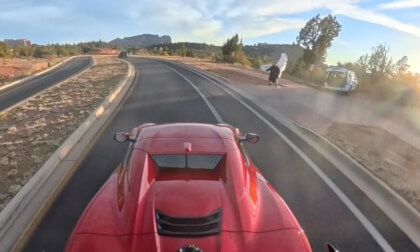Devil with wings on the side of the road.