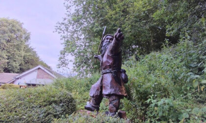 Carved Spearman outside Pooles Cavern Buxton