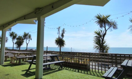 Felixstowe - Outside the Spa downstairs bar, looking out past the palm trees.