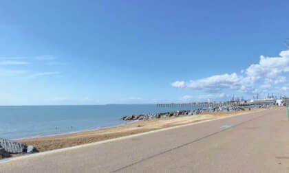 Felixstowe - On the promenade, looking towards the Pier, the Ferris wheel and the docks in the distance.