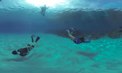 snorkeling at super clear beach at Okinawa Japan
