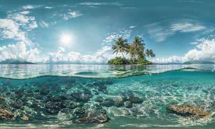 Exotic Ocean Scene With Tropical Island From POV Of Snorkeling